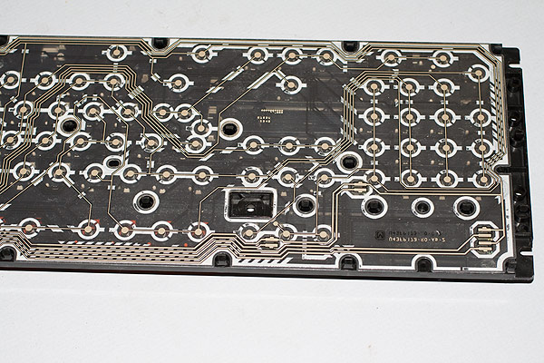 The A3000 keyboard membrane lined up on the chassis ready for the steel backing to be replaced.