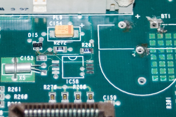 The damaged CMOS/RTC circuit after its initial clean